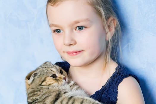 Image of beautiful girl with grey kitty