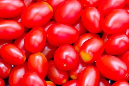 Photo of background with fresh red tomatos