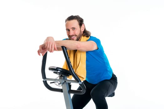 young man in blue shirt train with fitness machine