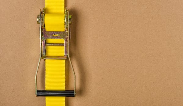 Yellow belt with ratchet with text clearance