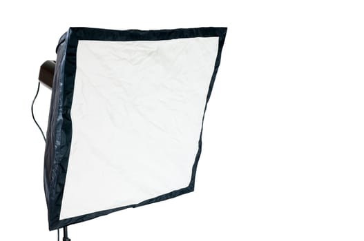 Compact studio flash unit with square softbox insulated to white