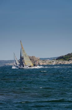 sailboat in one competition in sweden round one island in westcoast