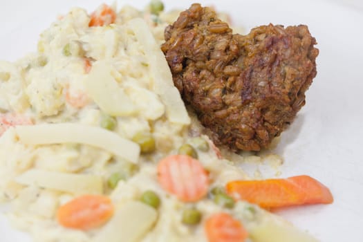 Vegetarian with heart - Green seed roasts on colorful vegetables,tasty,fresh and fast in preparation