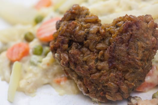 Vegetarian with heart - Green seed roasts on colorful vegetables,tasty,fresh and fast in preparation