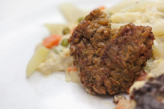 Vegetarian with heart - Green seed roasts on colorful vegetables,tasty,fresh and fast in preparation