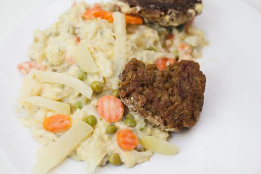 Vegetarian with heart - Green seed roasts on colorful vegetables,tasty,fresh and fast in preparation