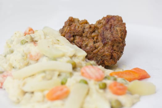 Vegetarian with heart - Green seed roasts on colorful vegetables,tasty,fresh and fast in preparation