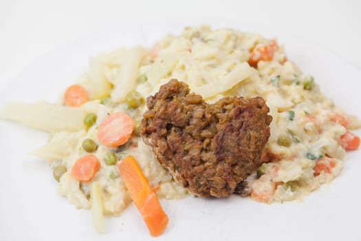 Vegetarian with heart - Green seed roasts on colorful vegetables,tasty,fresh and fast in preparation
