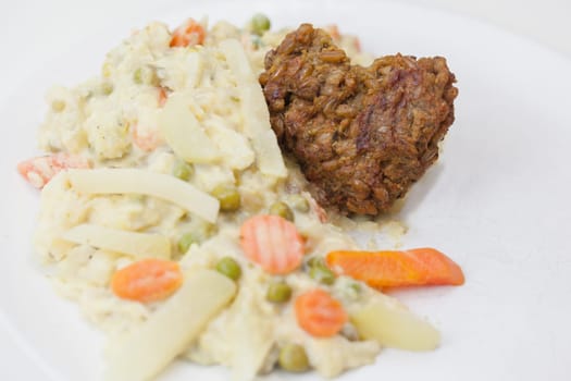 Vegetarian with heart - Green seed roasts on colorful vegetables,tasty,fresh and fast in preparation