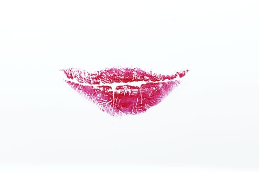 Red lipstick on white background