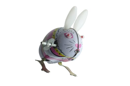 Wind-up vintage toy rabbit isolated on white background