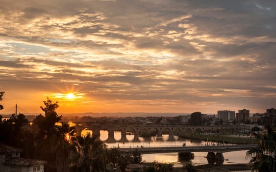Sunset with Badajoz bridges over Guadiana river