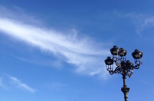 Classic Led street light against blue cloudy sky, Badajoz, Spain