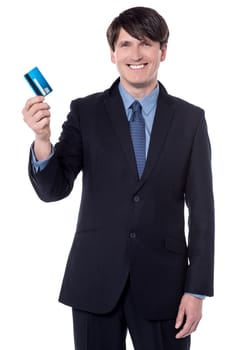 Picture of a happy boss displaying cash card