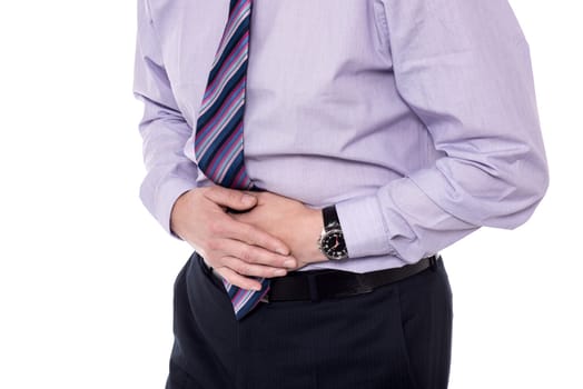 Business guy suffering from stomach pain
