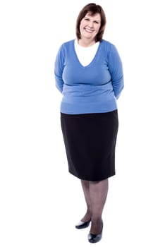 Senior woman posing to camera over white