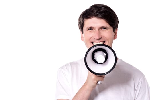 Casual man making an announcement over white