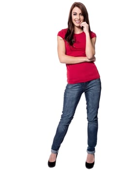 Pretty lady in denims posing in style