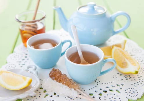Fresh tea with fresh lemon and honey