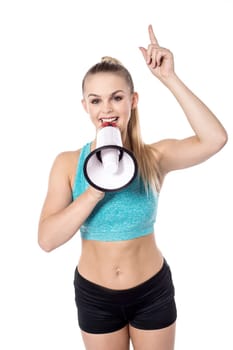 Pretty trainer speaking through megaphone