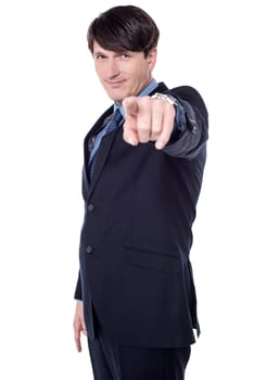 Smart businessman pointing his finger towards camera