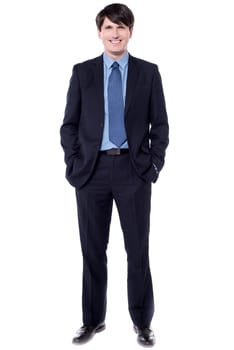 Confident entrepreneur with his hands in pockets