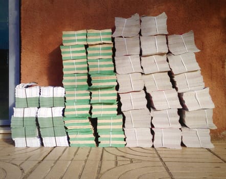 Packages of advertising brochures ready to deliver on mailboxes