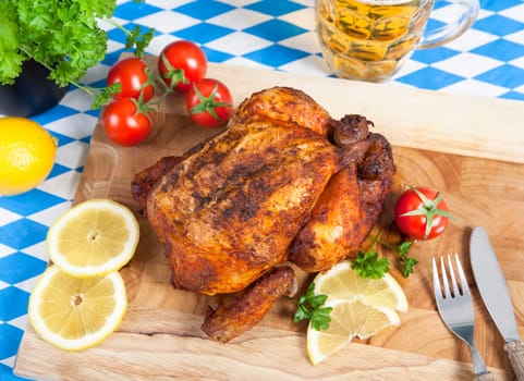 Add a whole fried chicken on a cutting board