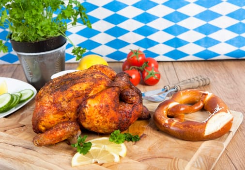 Add a whole fried chicken on a cutting board