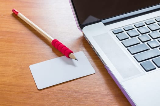 Simply freelance work table with laptop, stock photo