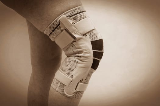 Knee bandage on a woman's leg