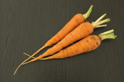 Carrot on wooden background
