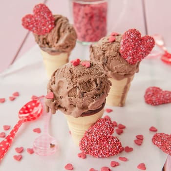 Chocolate ice cream in balls in small waffle cups