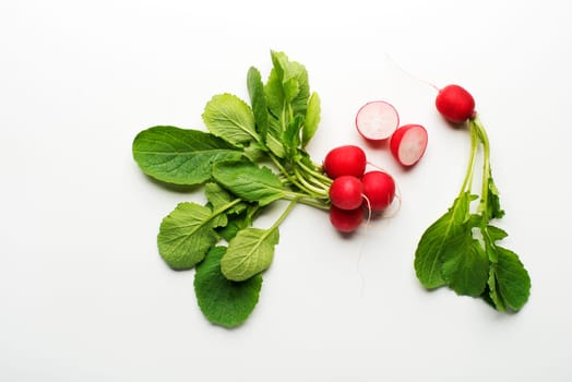Fresh red radish isolated on a white background close up.