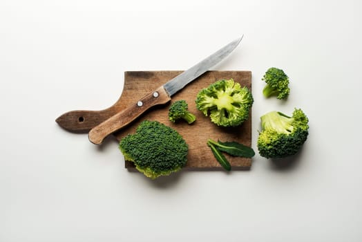 Fresh raw broccoli isolated on a white background.