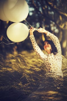 Girl with balloons