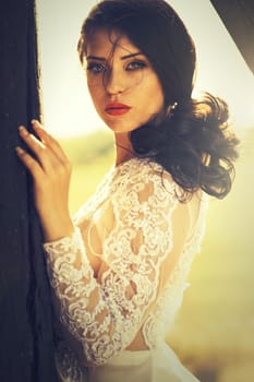 attractive brunette woman in lace dress