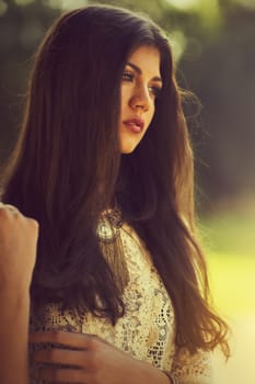 Portrait of an attractive woman with long,dark hair