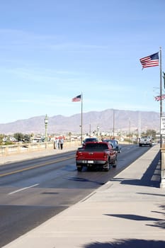 Lake Havasu City,United States - December 23,2015: Road and pedestrians cross the London Bridge,recreated by Robert P. McCulloch,on December 23,2015 in Lake Havasu City.