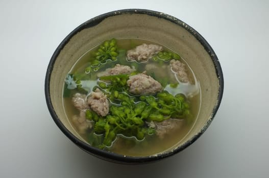 Vegetable soup with cowslip creeper and minced pork