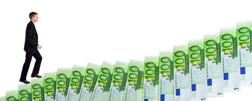 Isolated concept shot of a dynamic ambitious businessman climbing up banknotes arranged as stairs of success