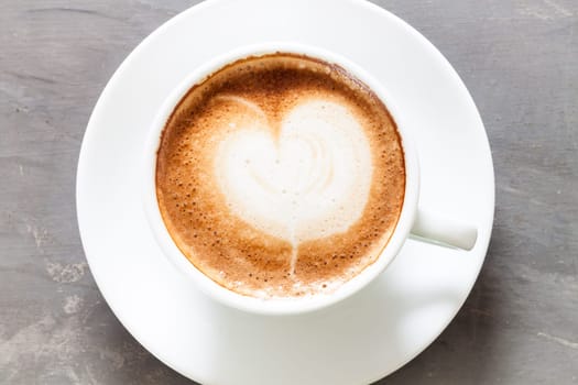 Coffee cup on grey background, stock photo