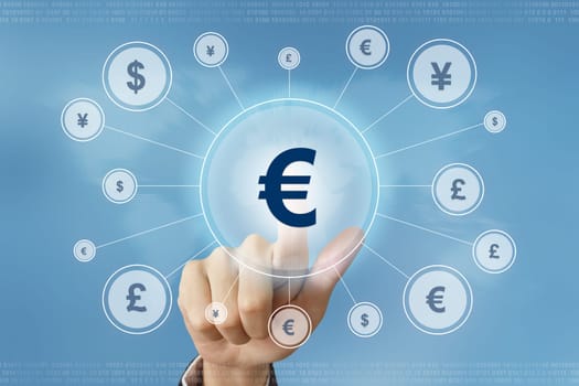 business hand pushing euro currency button with global networking concept