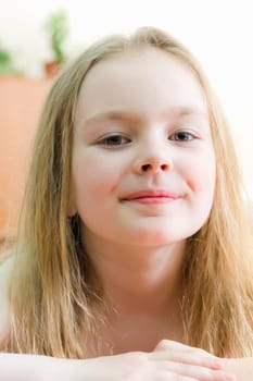 Portrait of cute girl with blond hair
