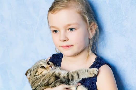 Image of beautiful girl with grey kitty