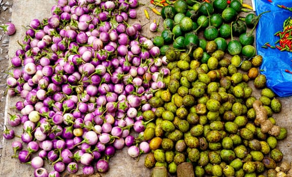 mixed vegetables purple eggplant, olive, in Farmer market Luang Prabang, Laos