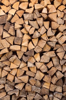 Stack of neatly arranged firewood ready for the winter