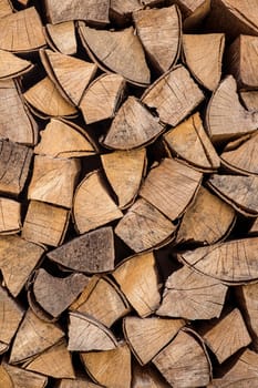 Stack of neatly arranged firewood ready for the winter