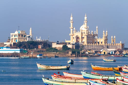 fishing harbour with mosque in the background (Arabian Sea, Kerala, India)