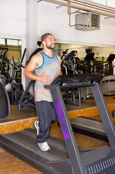 Man in the studio on the treadmill